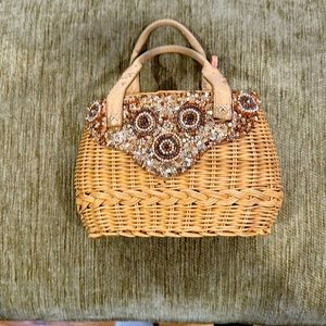 Wicker bag with embellished front